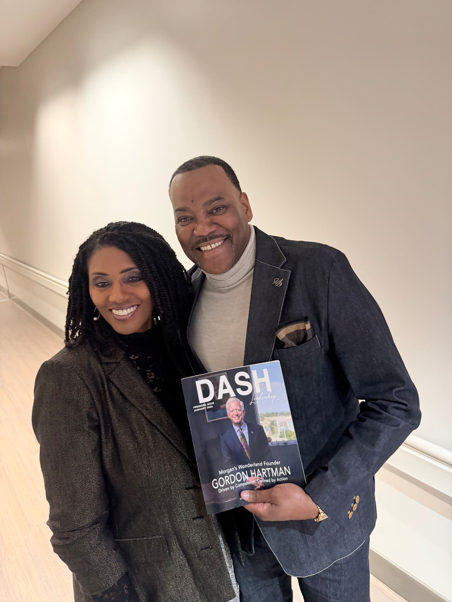 DASH Leadership founder with a guest holding the premiere issue of DASH Leadership magazine